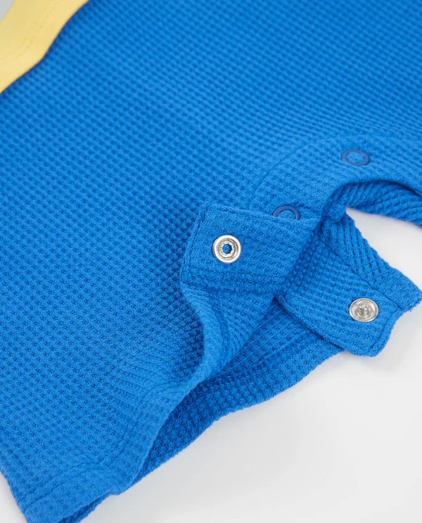 Pelele bebé niño Tuc Tuc abejita azul y amarillo alas relieve