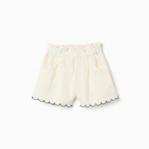 Pantalón corto Zippy beige claro con detalles en azul_26026