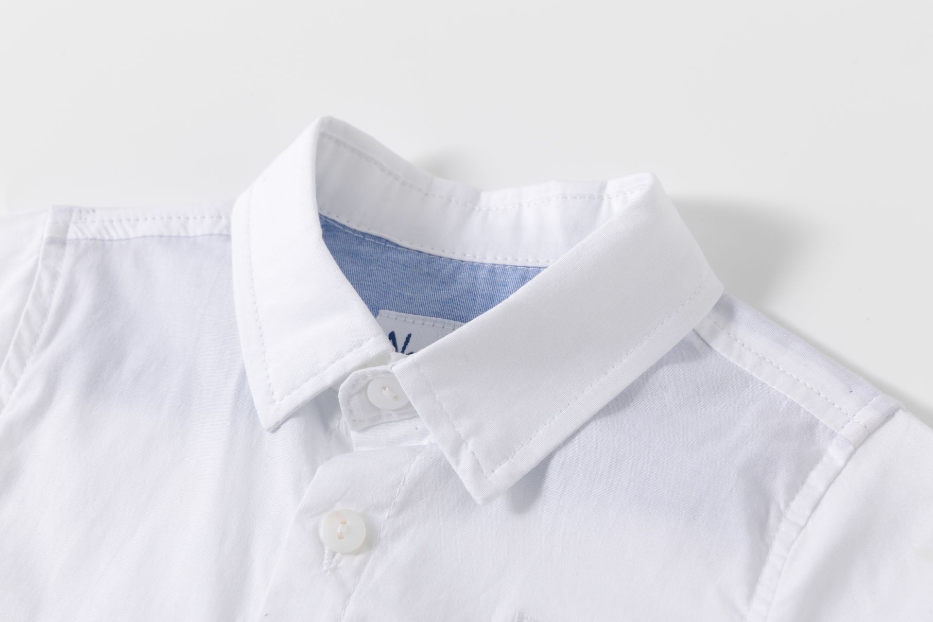 Camisa bebé niño manga larga blanca cuello picos bordado al tono delantero logo M&S trabilla manga algodón elastano