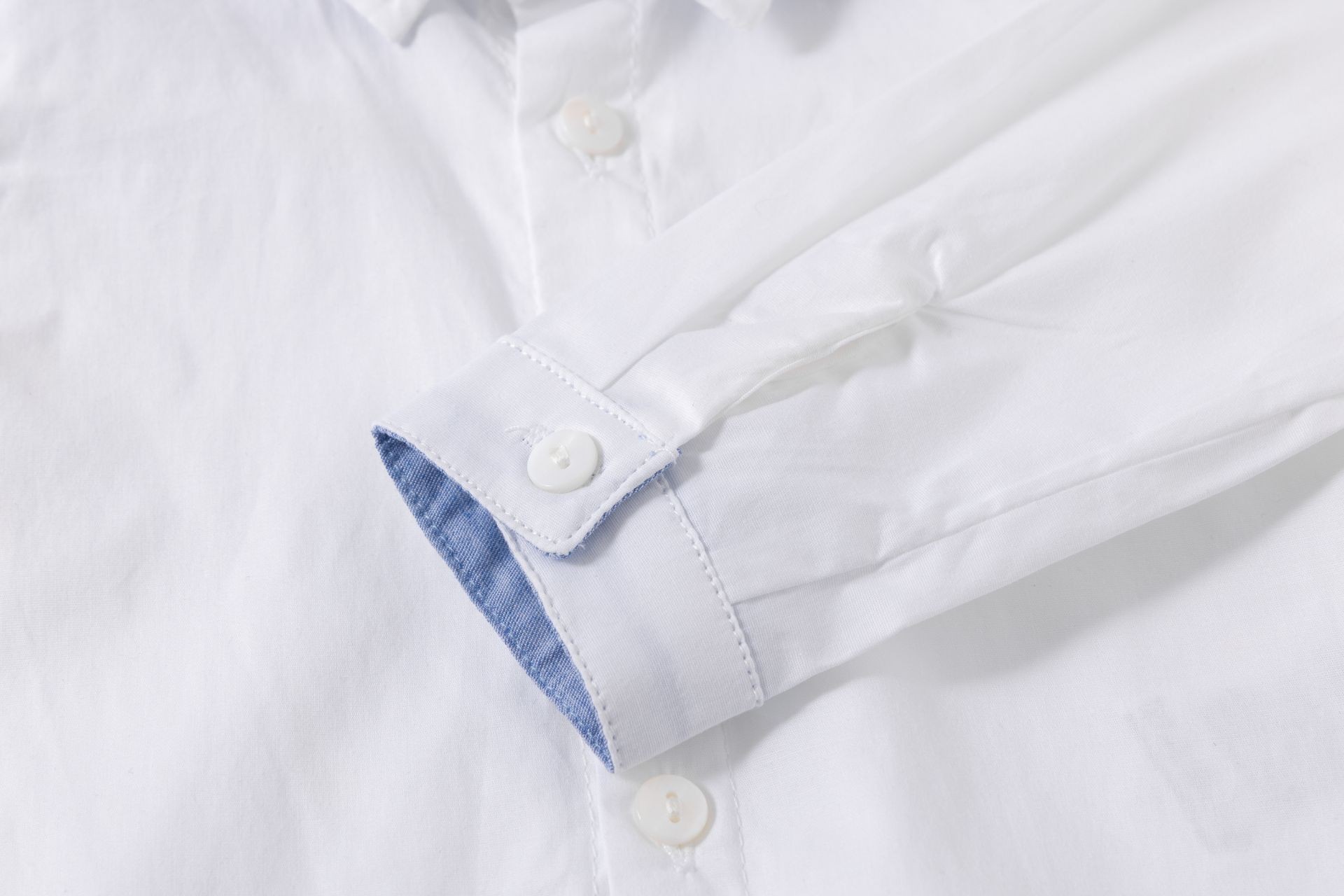 Camisa bebé niño manga larga blanca cuello picos bordado al tono delantero logo M&S trabilla manga algodón elastano