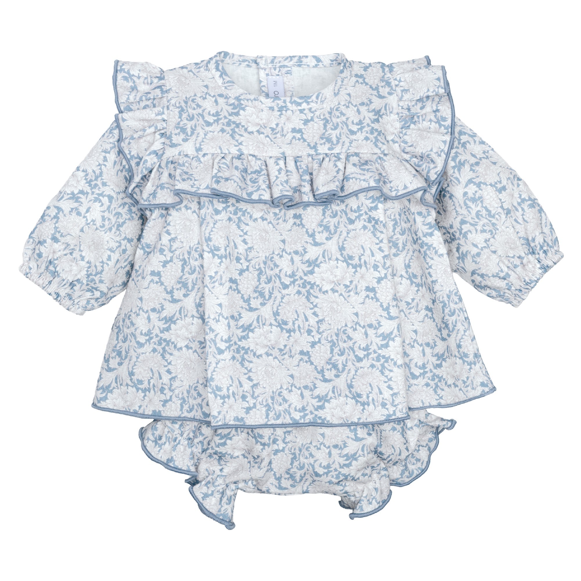 Jesusito bebe Calamaro Naron blanco roto estampado floral vegetal azul blanco cuello redondo volantes fruncidos ribete azul mangas abullonadas pololo volantes 1 mes