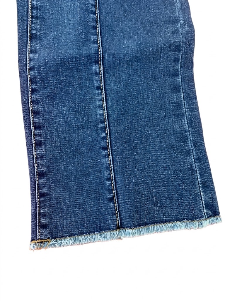 Vaqueros niña zippy Girl campana wide leg denim azul medio costuras verticales cremallera botones metálicos cintura ajustable gomas botones interiores bolsillos parche bajo deshilachado