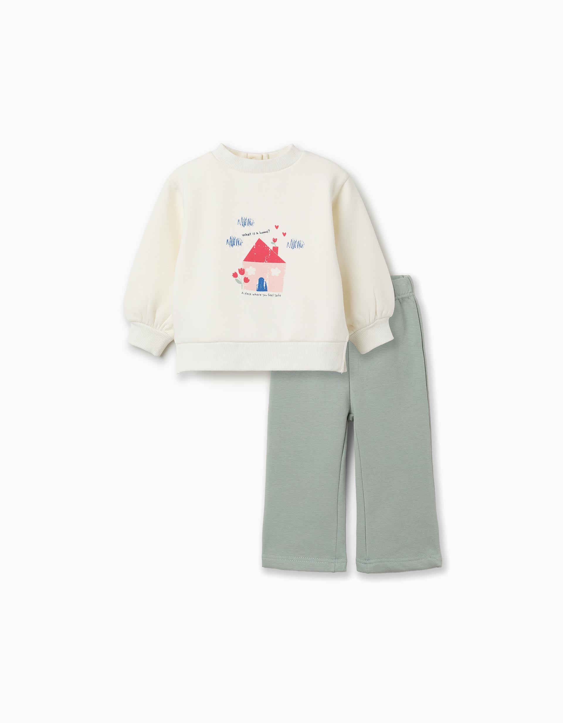Conjunto bebé niña sudadera blanco roto crema estampado casita rosa tejado rojo puerta azul corazones rojos nubes azules mensaje What is a home A place where you feel safe cuello redondo mangas largas abullonadas puños acanalados bajo acanalado aberturas laterales botones presión espalda pantalón felpa verde menta agua cintura elástica pierna ancha interior afelpado
