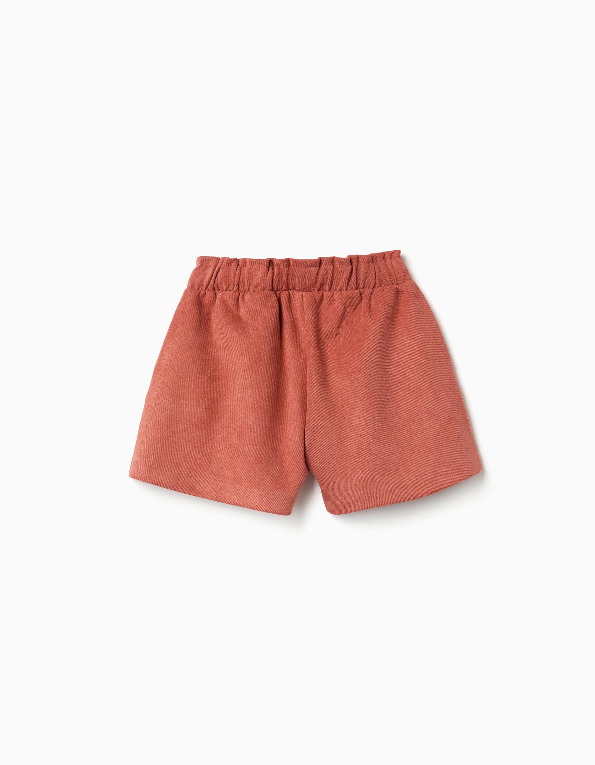 Shorts niña pana fina teja terracota cintura elástica paperbag lazo decorativo bolsillos laterales botón interior ajustable