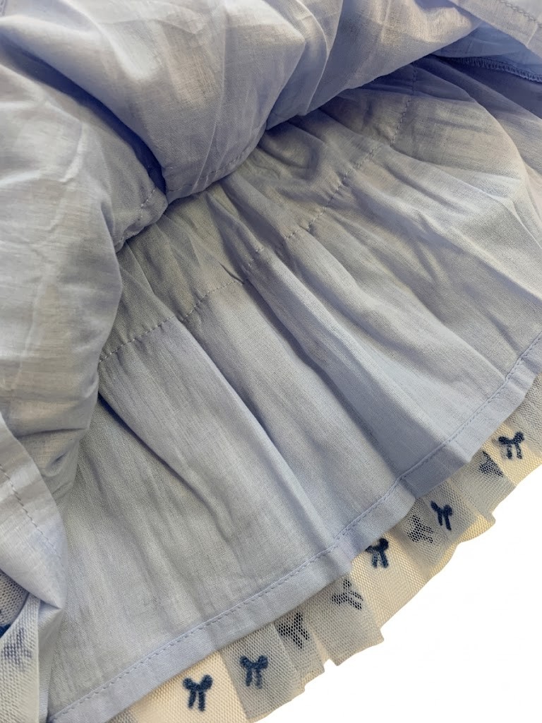 Falda niña tul azul claro lacitos bordados azul marino capas fruncido cintura elástica cinta satén forro