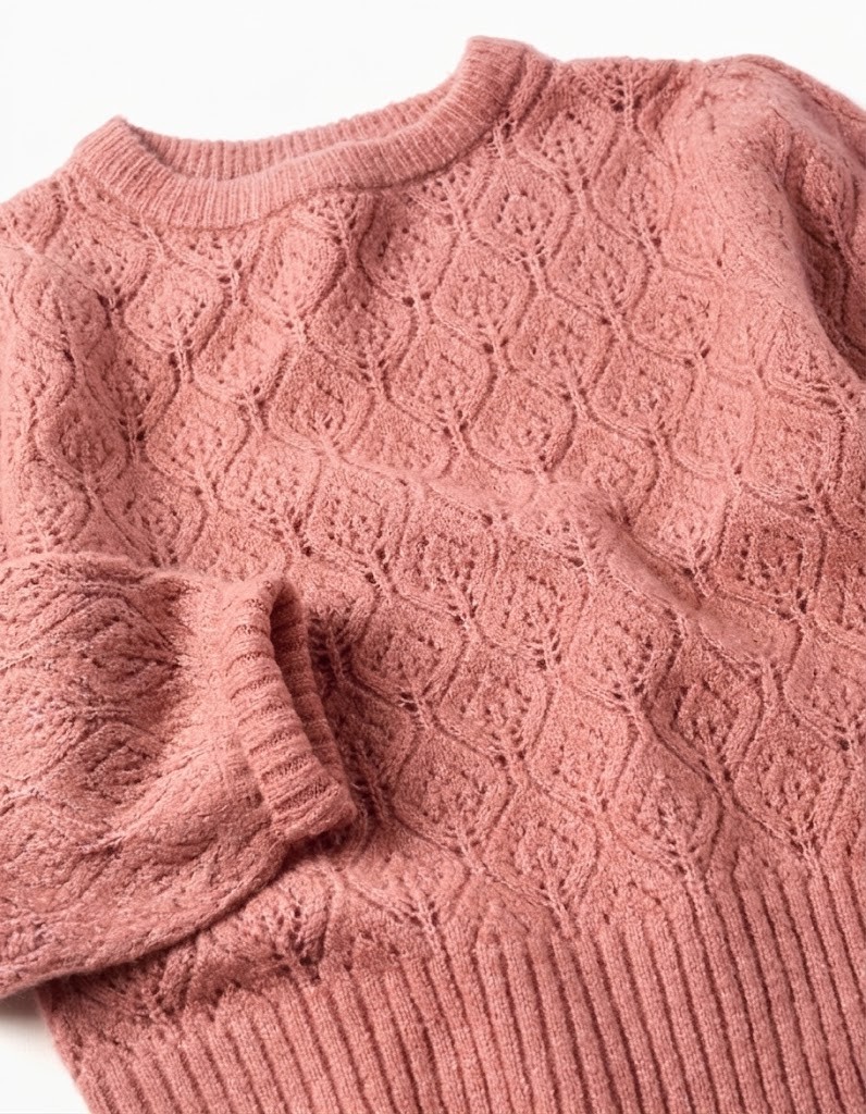 Jersey niña punto calado teja terracota patrón hojas rombos cuello redondo acanalado mangas largas puños acanalados bajo acanalado espalda lisa