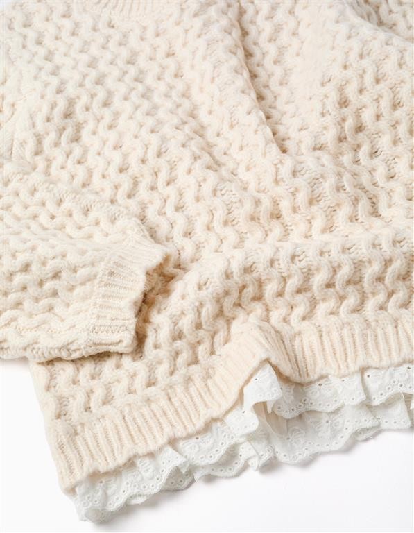 Jersey niña punto trenzado ochos encaje blanco roto crema cuello redondo mangas abullonadas puños acanalados