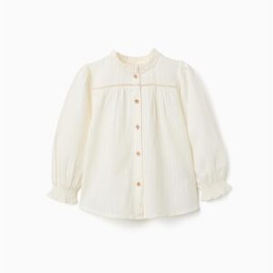 Blusa niña blanco roto cuello alto volantes canesú encaje bordado botones madera puños elásticos volantes