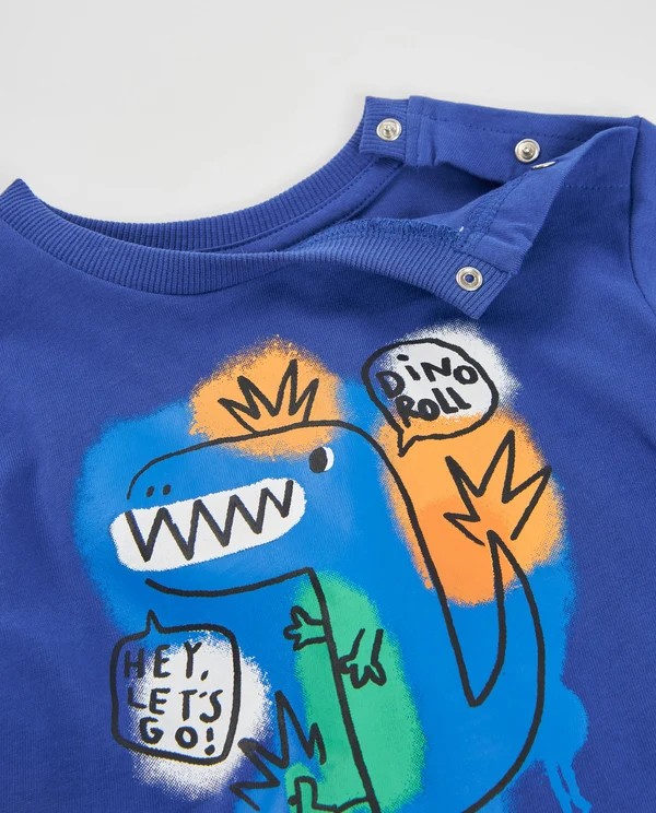 Camiseta niño Tuc Tuc manga larga azul intenso eléctrico algodón dinosaurio grafitero monopatín "HEY, LET'S GO!" "DINO Roll" manchas pintura botones presión hombro cuello redondo
