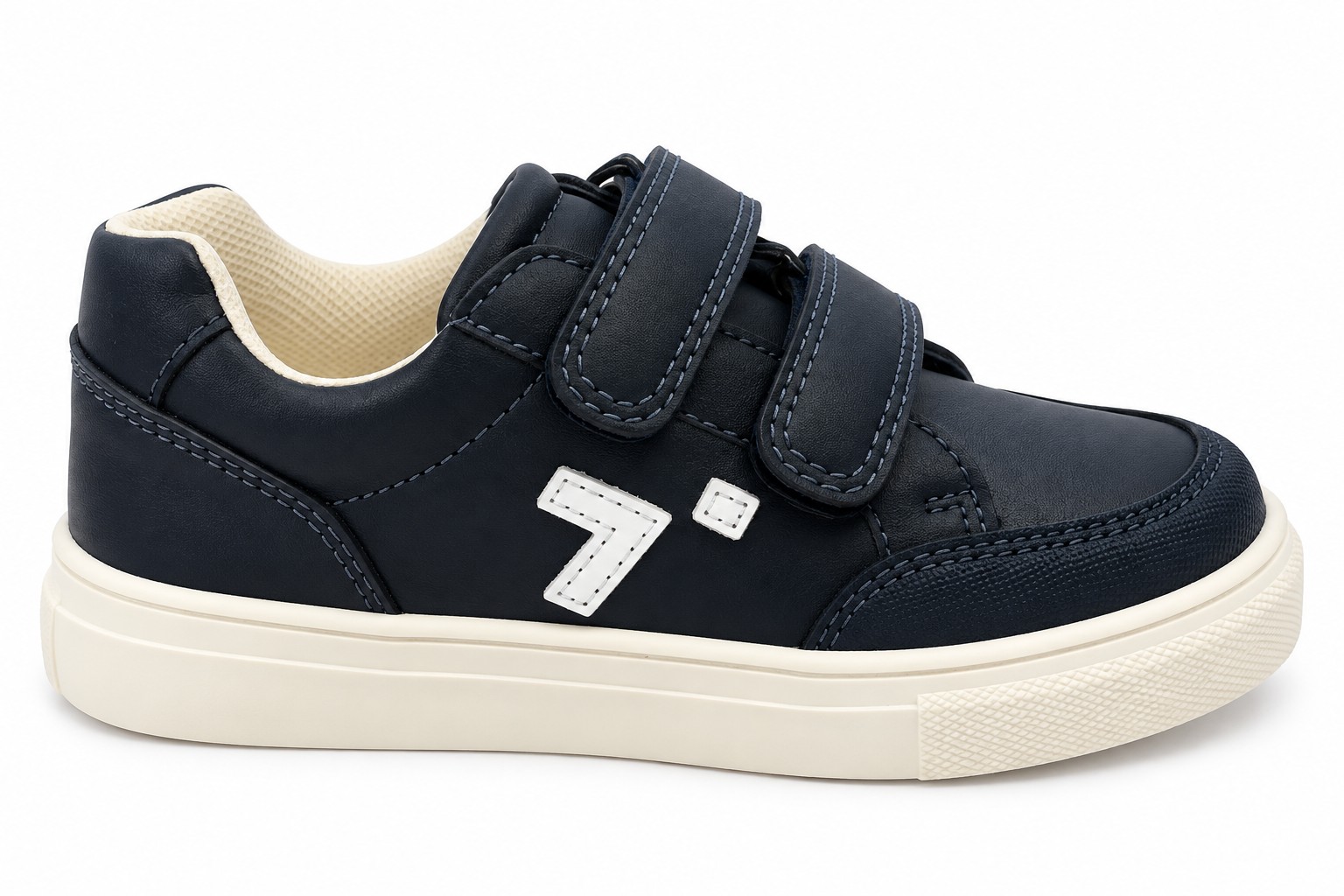 Deportivas niño niña doble velcro azul marino suela blanca flexible patrón ondulado logo lateral blanco costuras decorativas puntera reforzada interior acolchado crema blanco roto