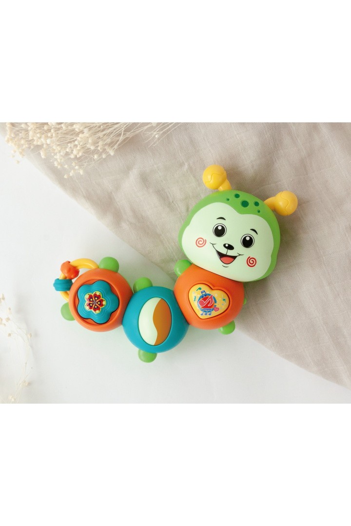 Gusanito musical bebé Kiokids juguete interactivo oruga verde naranja azul turquesa 18 melodías luz sonido cuerpo giratorio crack anillas juegos estimulación +6 meses plástico ABS TPR pilas AAA 14x13cm caja regalo 20x20x8cm Gusanito musical bebé Kiokids juguete interactivo oruga verde naranja azul turquesa 18 melodías luz sonido cuerpo giratorio crack anillas juegos estimulación +6 meses plástico ABS TPR pilas AAA 14x13cm caja regalo 20x20x8cm